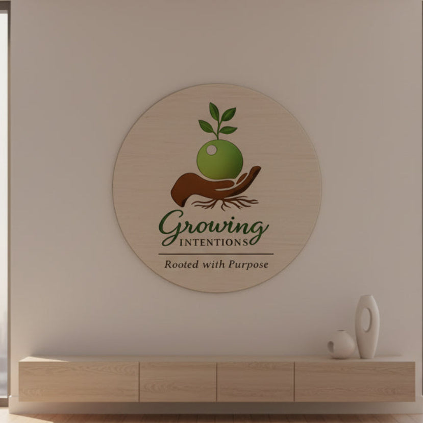 Logo of 'Growing Intentions' with a hand holding an apple, symbolizing growth and purpose.